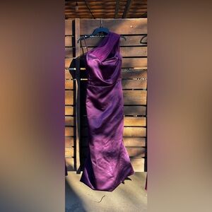 Bridesmaid, mother of the bride or prom. Somewhat of a mermaid fit.